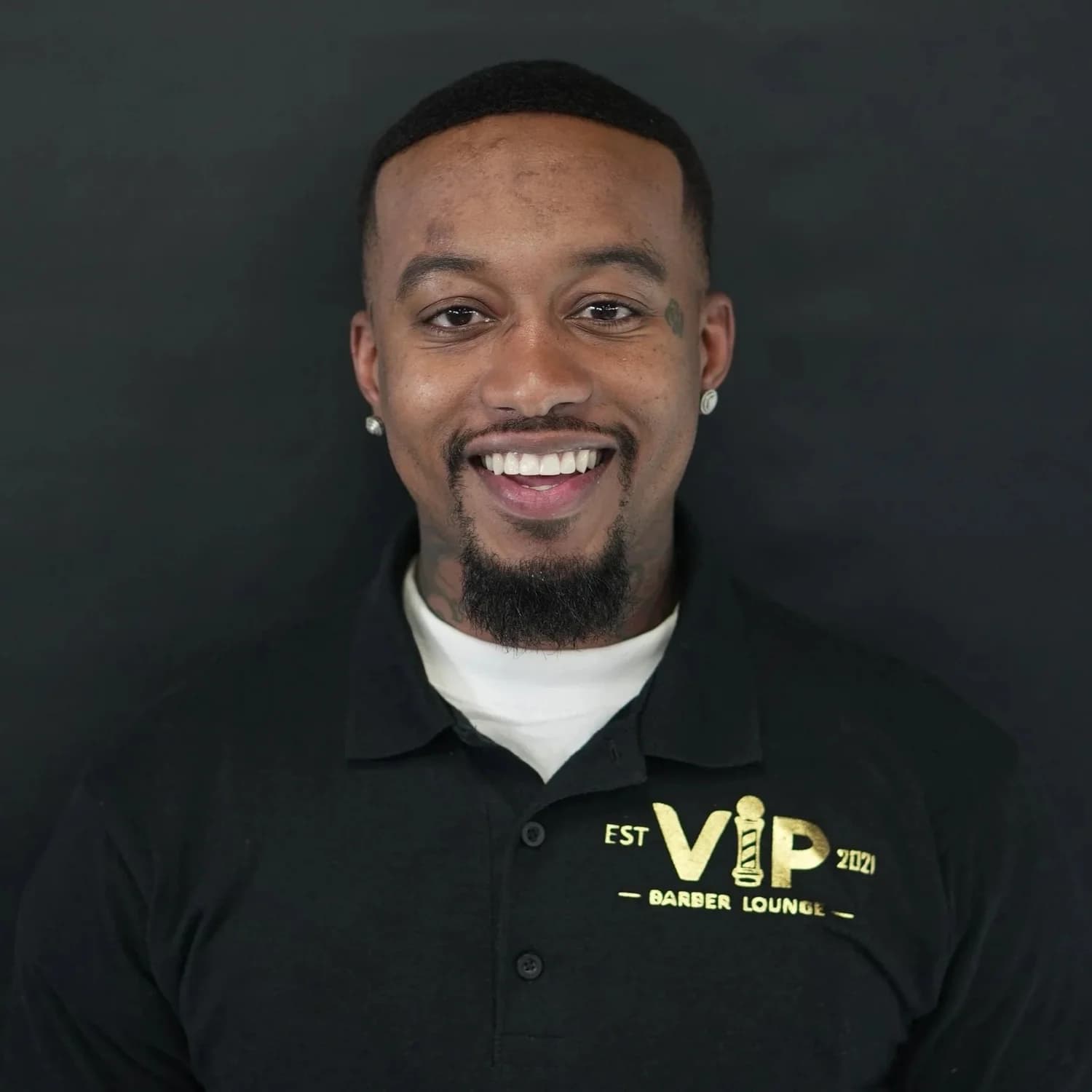 Dontae, barber at VIP Barber Lounge Denver
