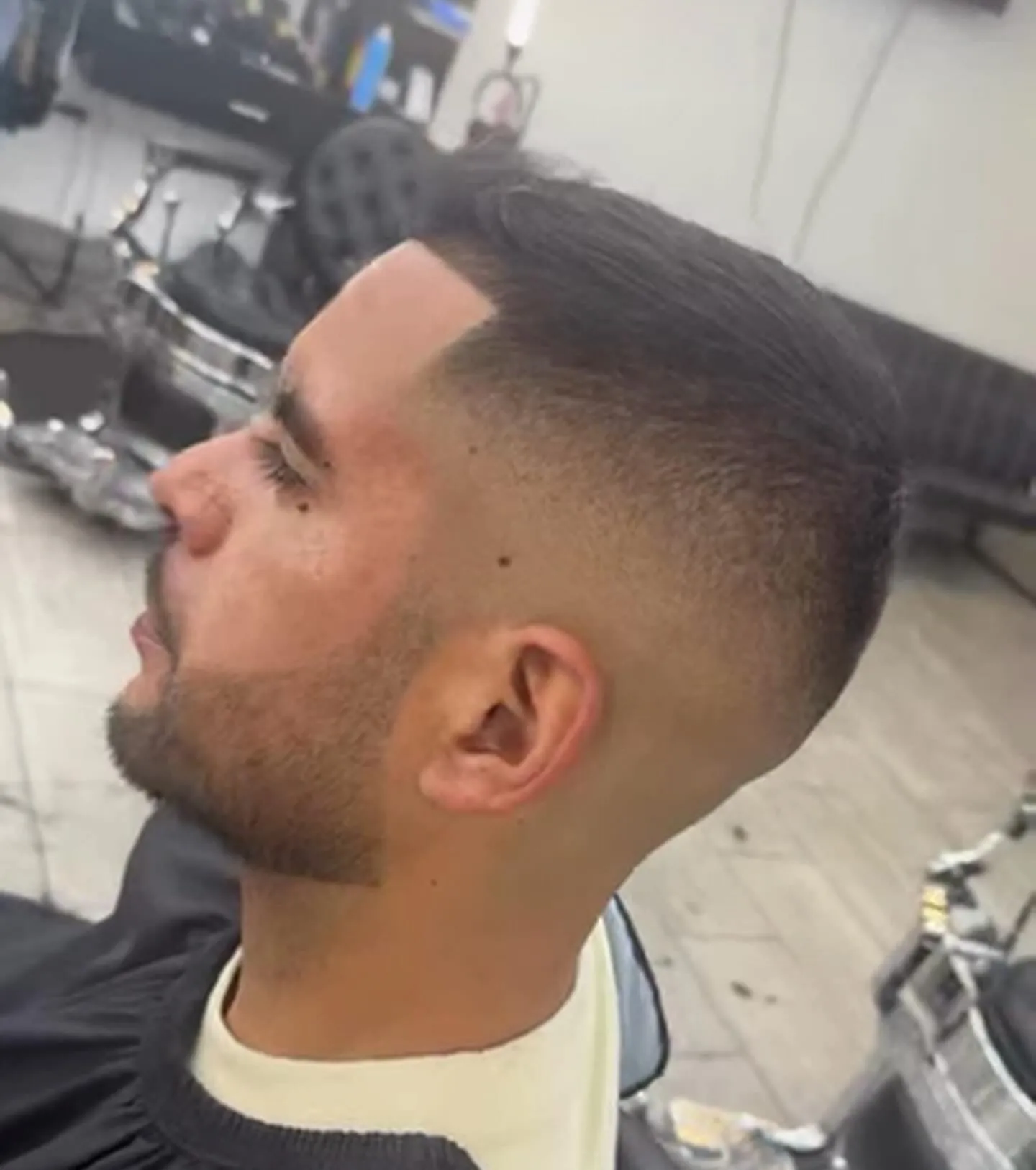 Low taper with a textured top at VIP Barber Lounge, Denver & Aurora