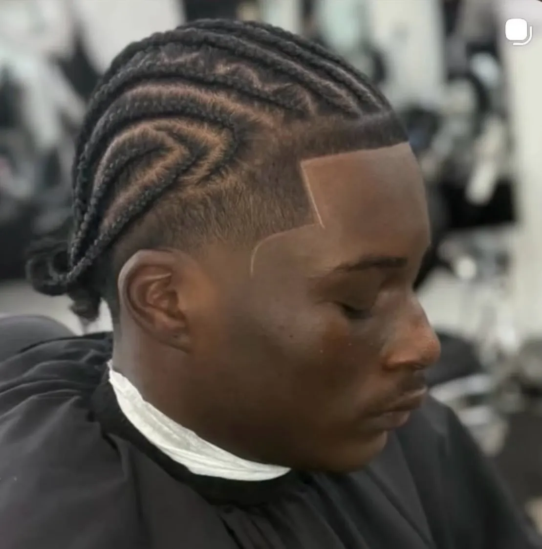 Cornrow braids with a crisp hairline at VIP Barber Lounge, Denver & Aurora